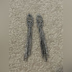 Earring and necklace set. One of the gems from the necklace is missing.